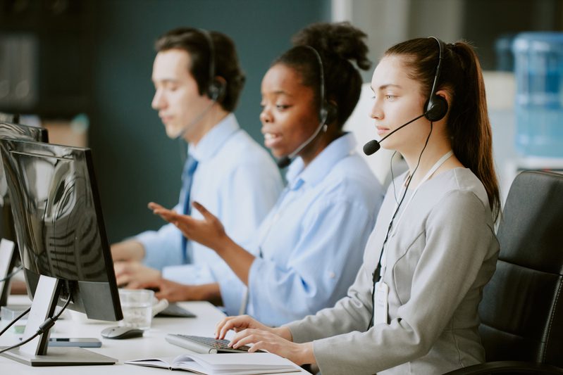 Team of Young Operators at Work BID‑Wide Customer Service